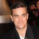 Robbie Williams spí se psy!